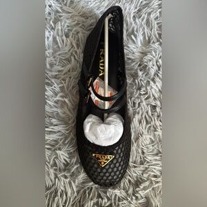 Prada Women's Black Loafers with Gold Accents